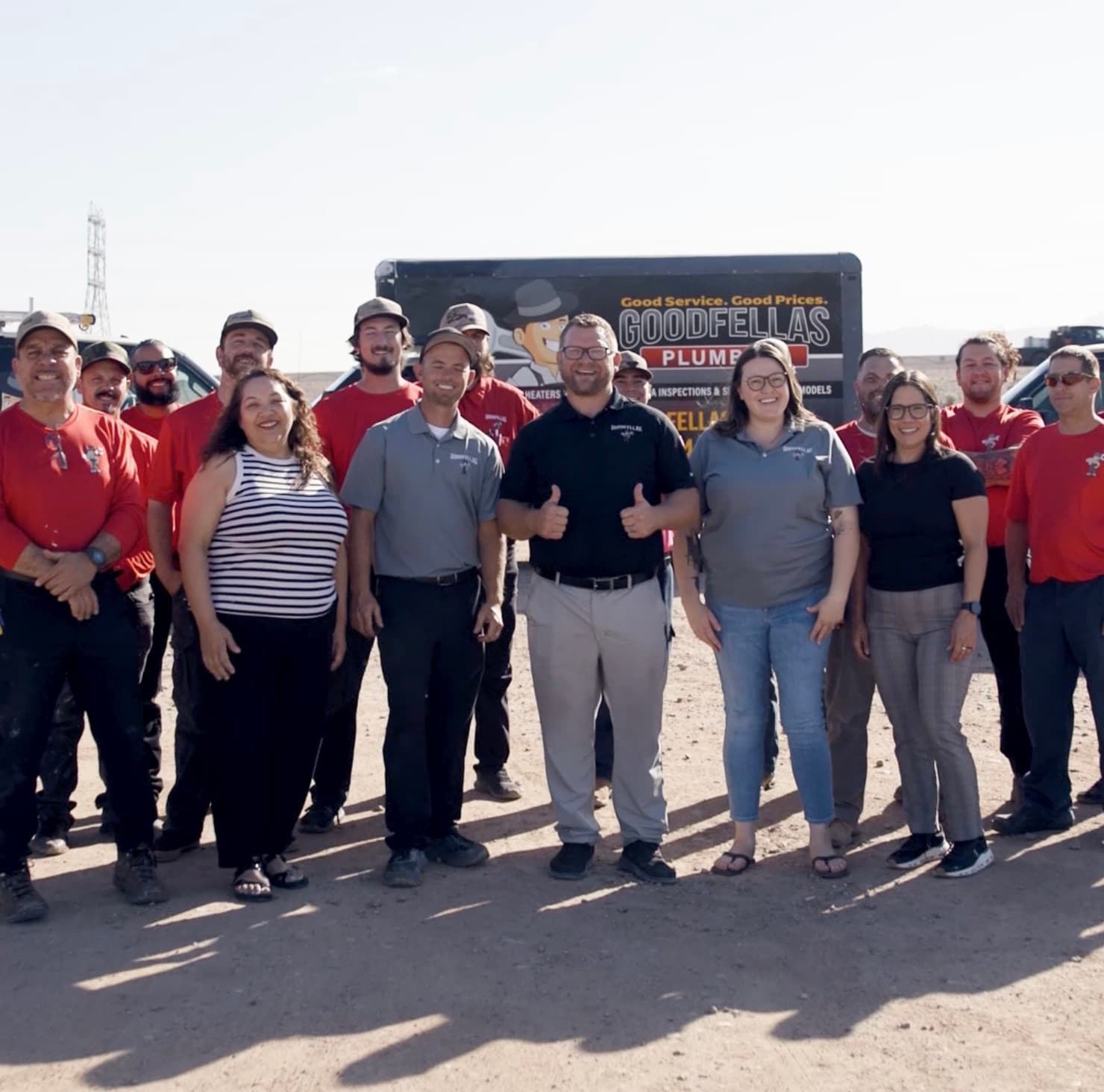 Brent Lush and the GoodFellas Air Conditioning and Plumbing team standing in front of a company truck in Tucson